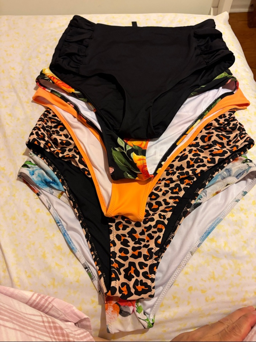 A bundle of new  High-Waist Swim Bottoms - Black, Orange & Leopard Print